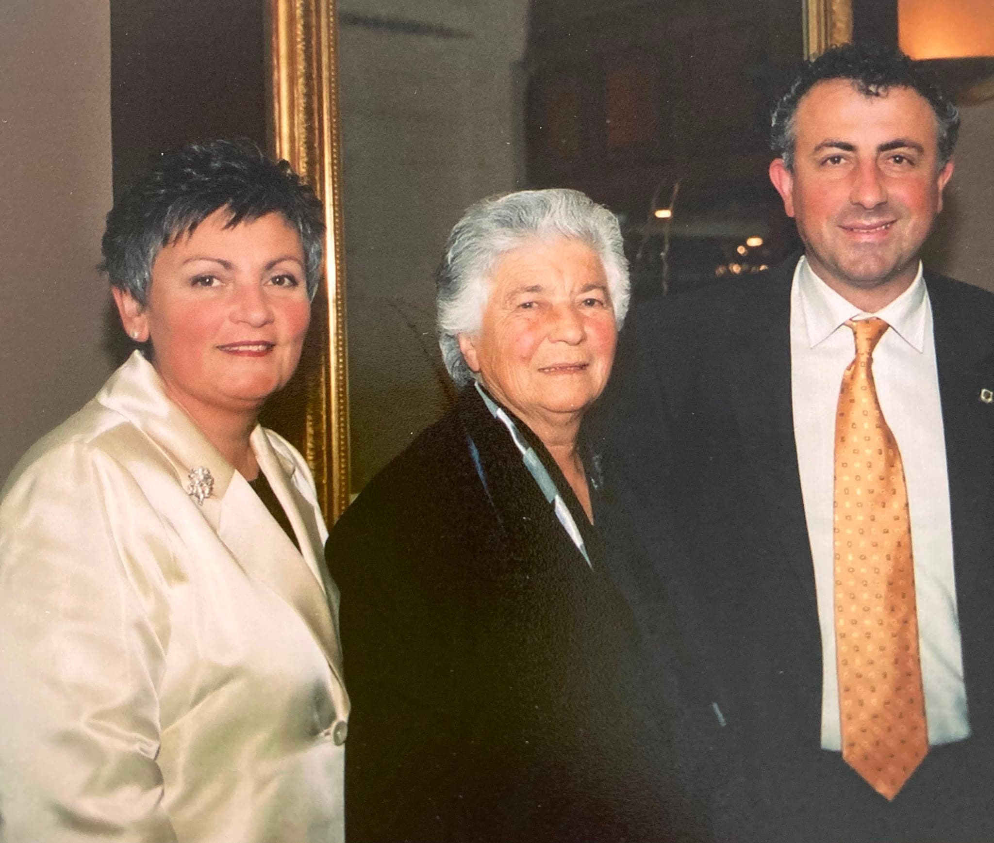 Olga Athanasopoulous and Greg Stamboulidis at a formal event